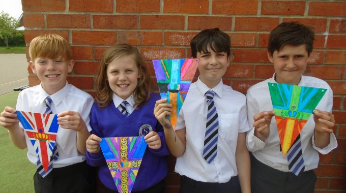 Stalham Infant & Junior Schools Students With Bunting – Credit Stalham Infant & Junior Schools